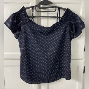 Spaghetti strap, off the shoulder blouse.